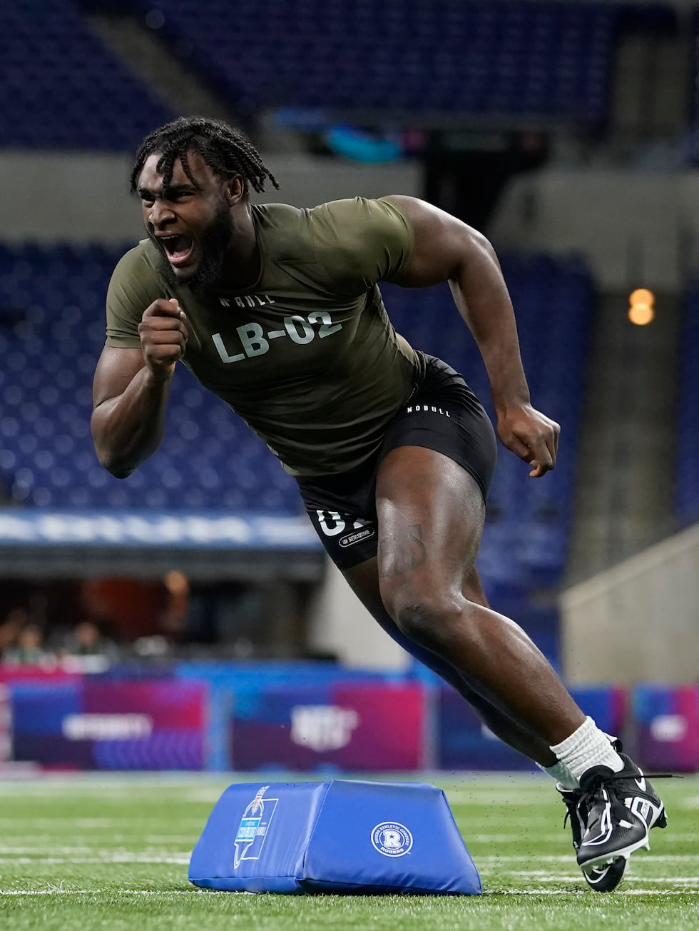 FILE - Alabama linebacker Will Anderson runs a drill at the NFL football scouting combine in...