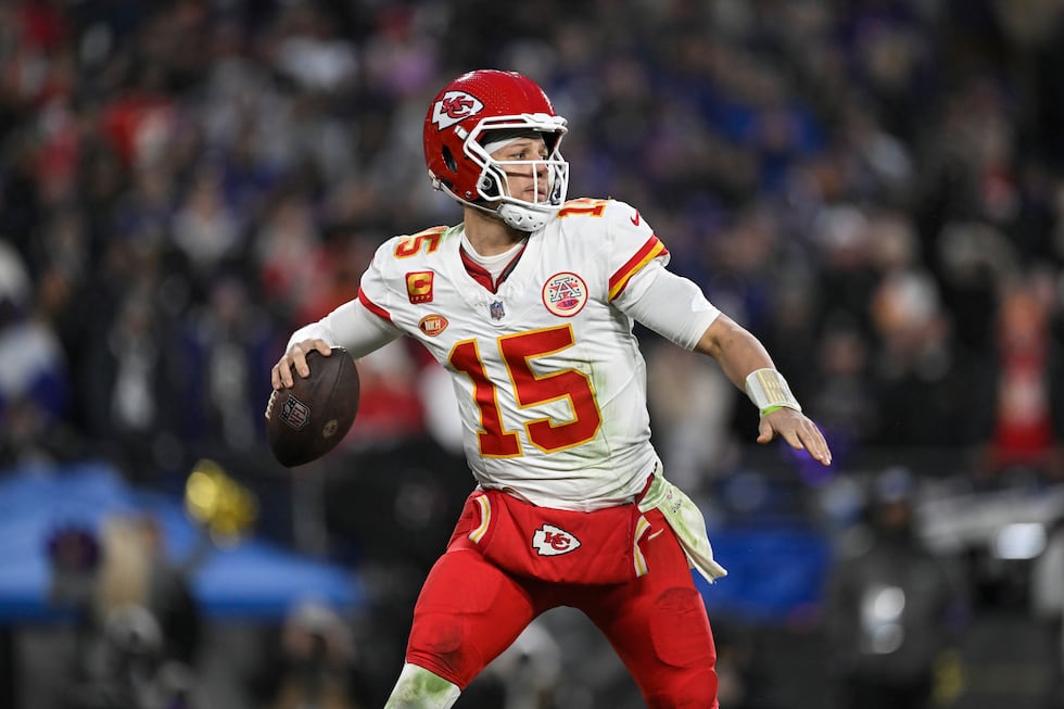 FILE - Kansas City Chiefs quarterback Patrick Mahomes (15) throws a during the second...