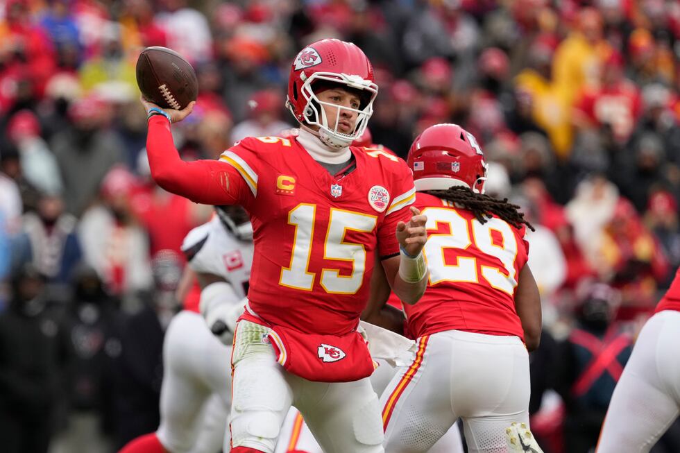 Kansas City Chiefs quarterback Patrick Mahomes (15) throws during the first half of an NFL...