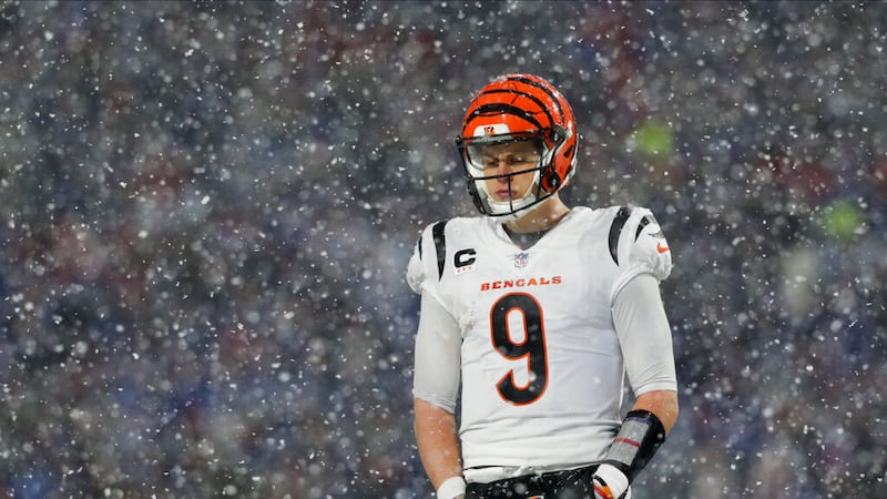 Cincinnati Bengals quarterback Joe Burrow (9) walks on the field between plays against the...