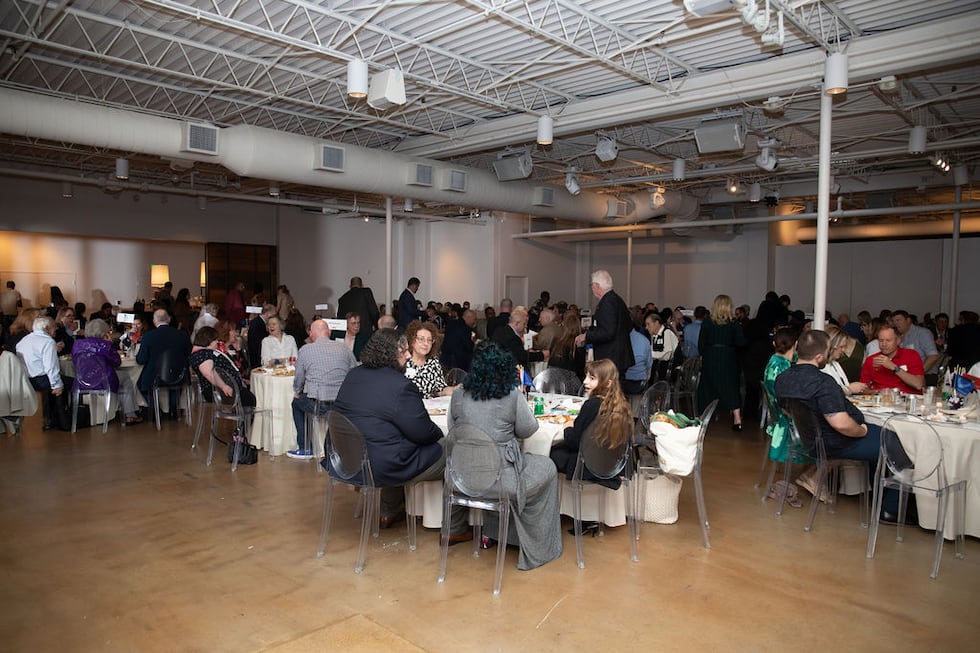 Hundreds of Kansas Citians came together to raise $60,000 to help put homeless or disabled...