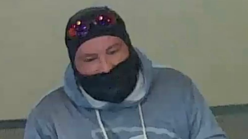 Weeks after a bank robber entered the Country Club Bank in Kansas City, Kansas, and pointed a...