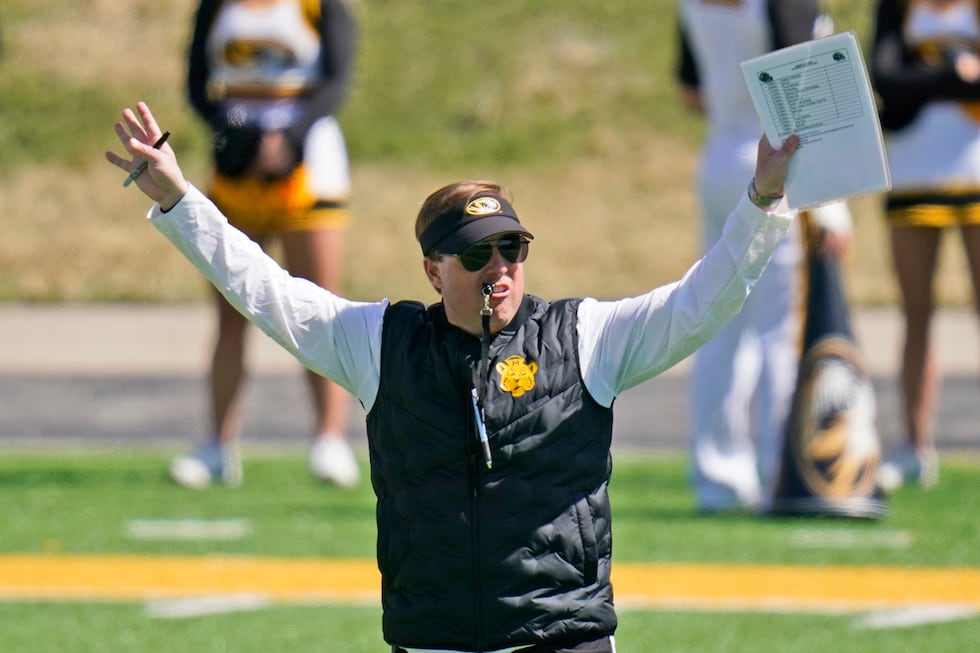 FILE - Missouri head coach Eliah Drinkwitz watches his team during an NCAA college football...
