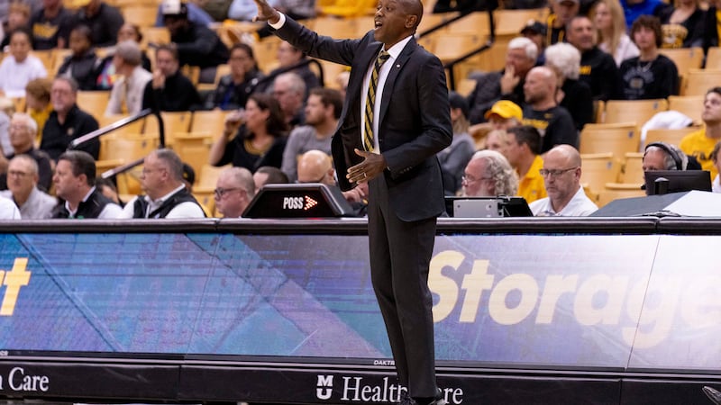 Missouri head coach Dennis Gates positions his players during the first half of an NCAA...