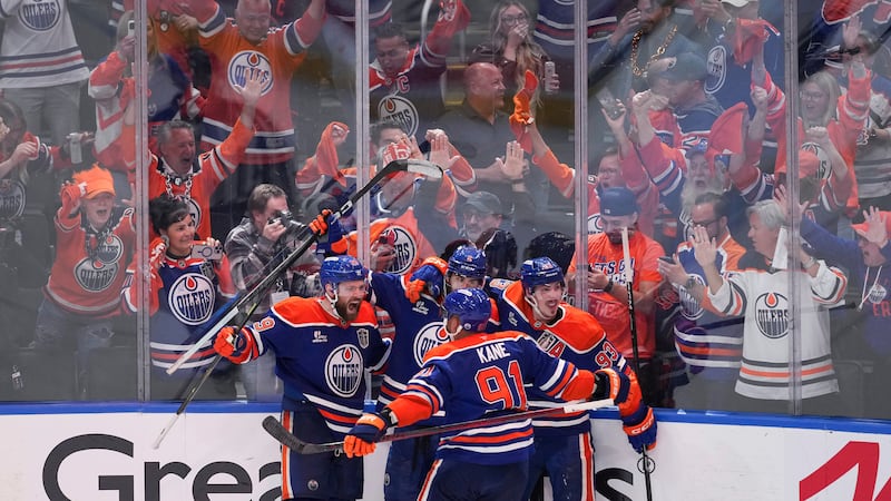 Edmonton Oilers' Leon Draisaitl, from left to right, Evan Bouchard, Evander Kane, Ryan...