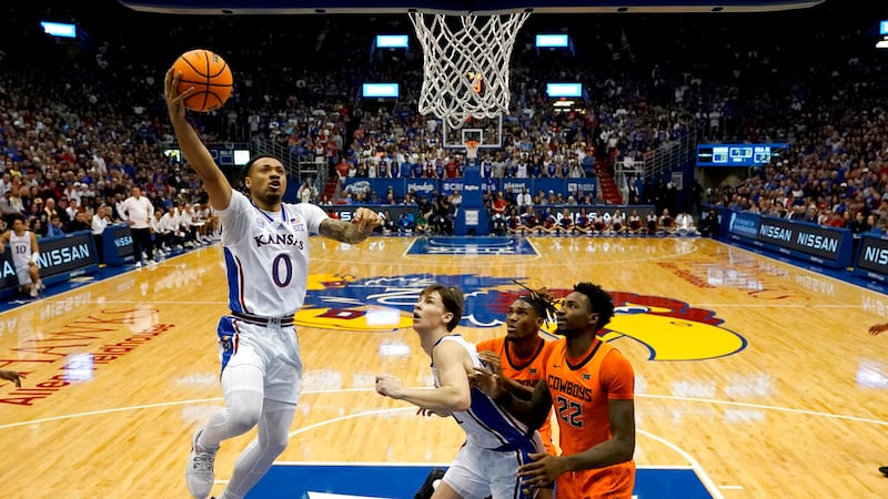 Kansas Jayhawks guard Bobby Pettiford Jr. (0) puts up a shot during the first half of an NCAA...