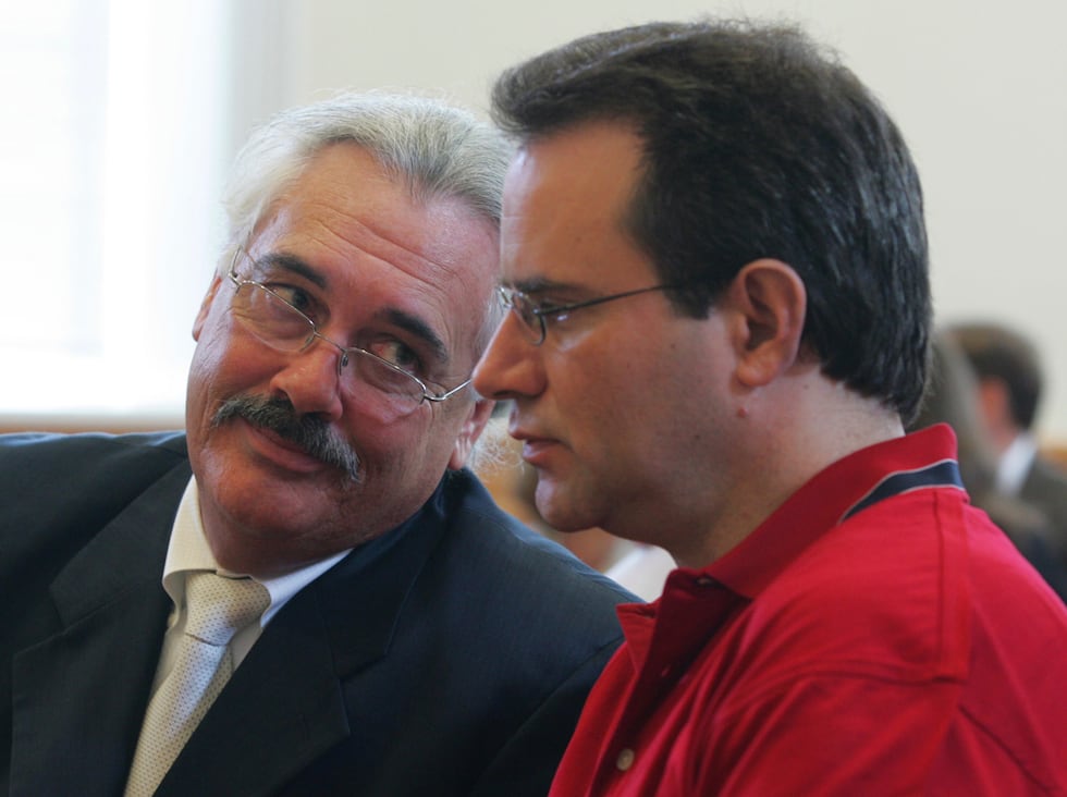 FILE - Defense attorney Gerald Kelly confers with defendant Stephen Stanko during a pretrial...
