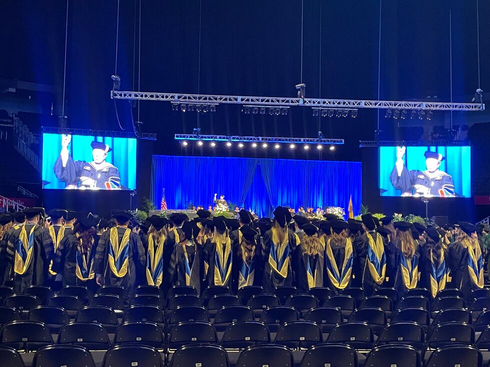 UMKC graduates took a walk to across the T-Mobile Center stage ready to embark on the...