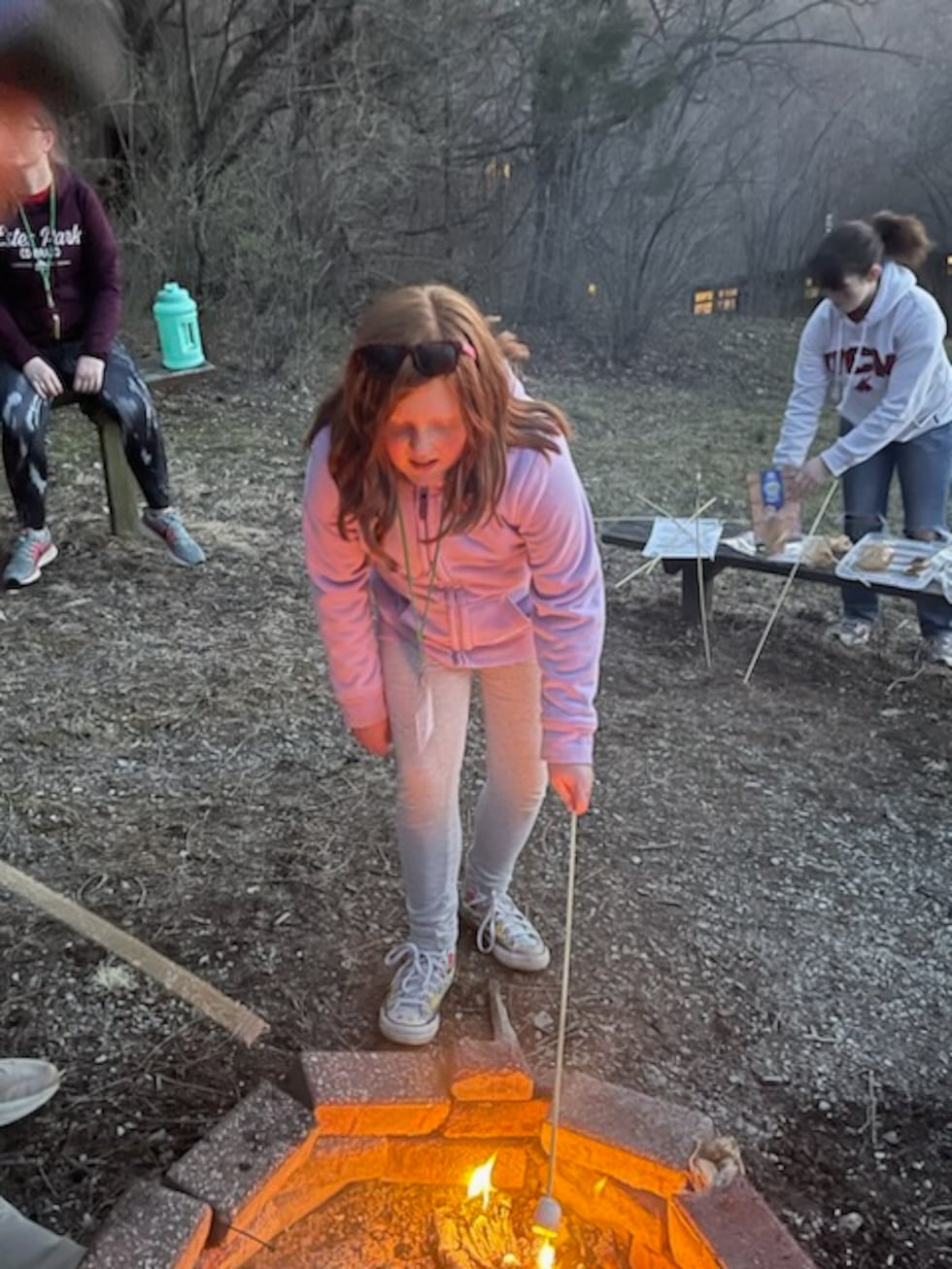 Leslie Cimino had to fight back tears reflecting on how much Camp Encourage had improved her...