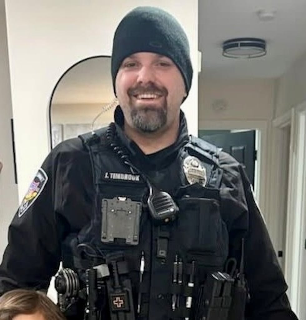 Lee's Summit Police Department Officer Jared Timbrook was shot four times by a suspect during...