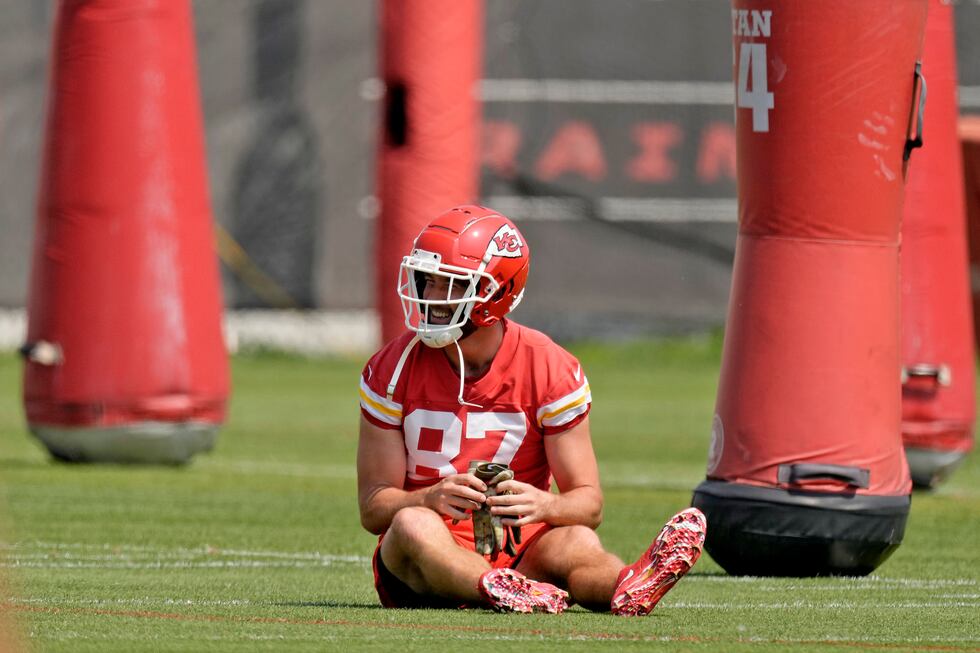 Kansas City Chiefs tight end Travis Kelce stretches during the NFL football team's organized...