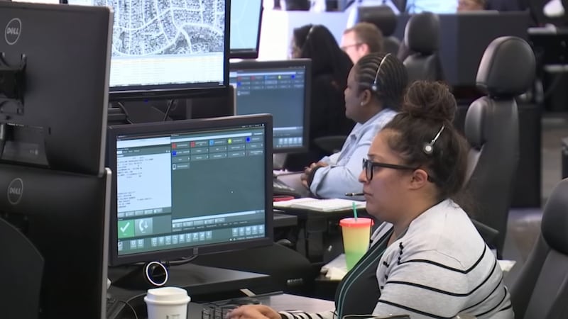 KANSAS CITY, Mo. -- Dispatchers answer calls inside the city's 911 call center on August 2, 2023.