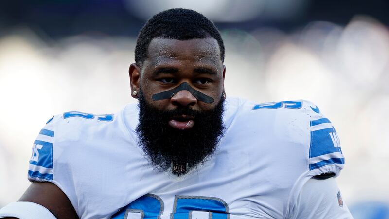 Detroit Lions defensive end Isaiah Buggs (96) warms up before an NFL football game against the...