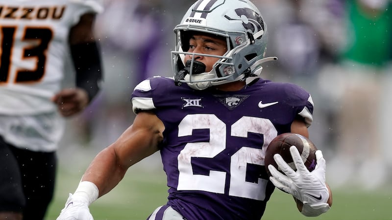 FILE: Kansas State running back Deuce Vaughn runs for a touchdown during the second half of an...
