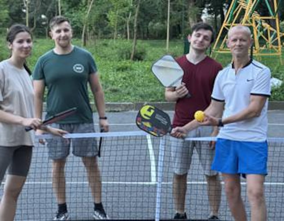 Ukrainians learning to play pickleball in 2023