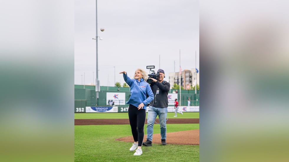 KCTV anchor Carolyn Long threw out the first pitch at the Kansas City Monarchs game on...