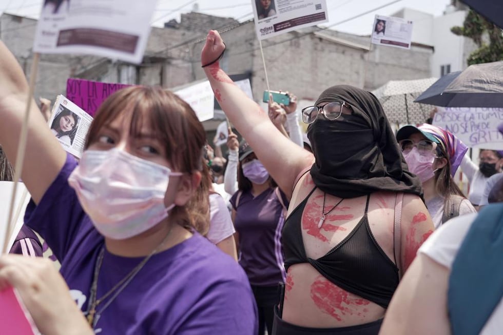 Women march against the recent murders of several women, in the Mexico City suburb of...