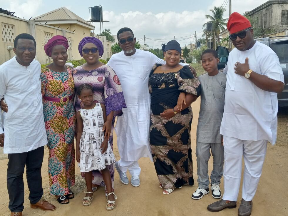 Dr. Onema Adojoh with his family on a visit to Nigeria.