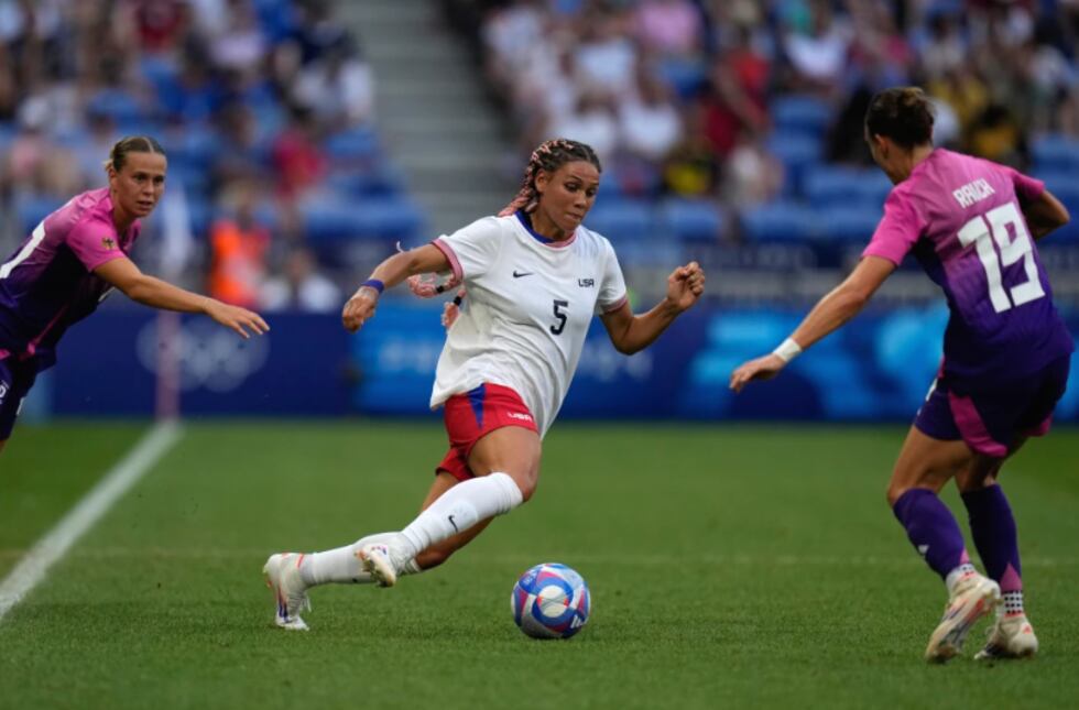 United States’ Trinity Rodman (5) dribbles t ’s Felicitas Rauch, right, during a...