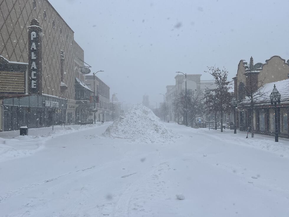 Snow is plowed into a huge pile on Nichols Rd. on the Country Club Plaza on Jan. 5, 2025.