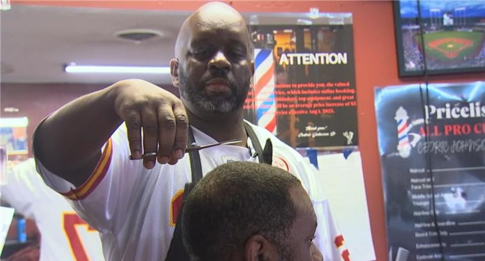 Cedric Johnson, who owns All Pro Cuts Barber Shop on Parallel Parkway in KCK, said he is...