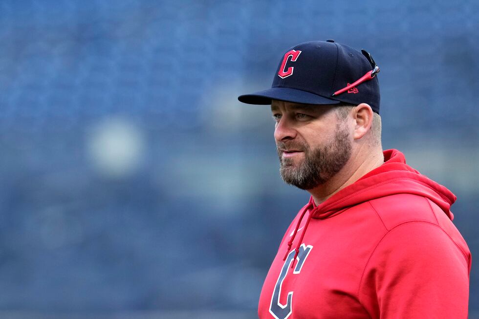 Cleveland Guardians manager Stephen Vogt watches during a workout Sunday, Oct. 13, 2024, in...