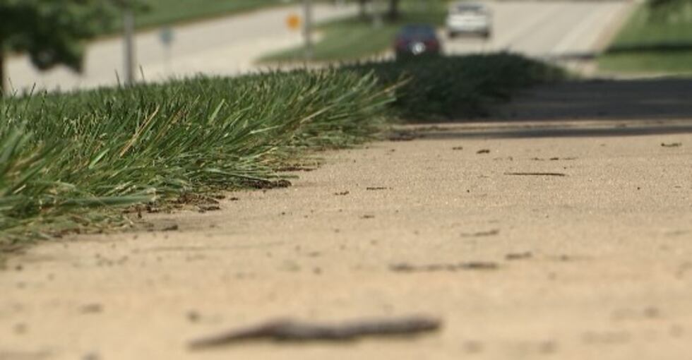 FILE - Overland Park sidewalk