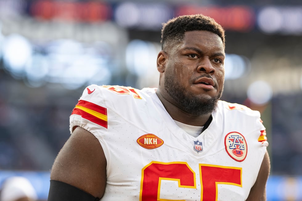 Kansas City Chiefs guard Trey Smith (65) walks back to the locker room before an NFL football...