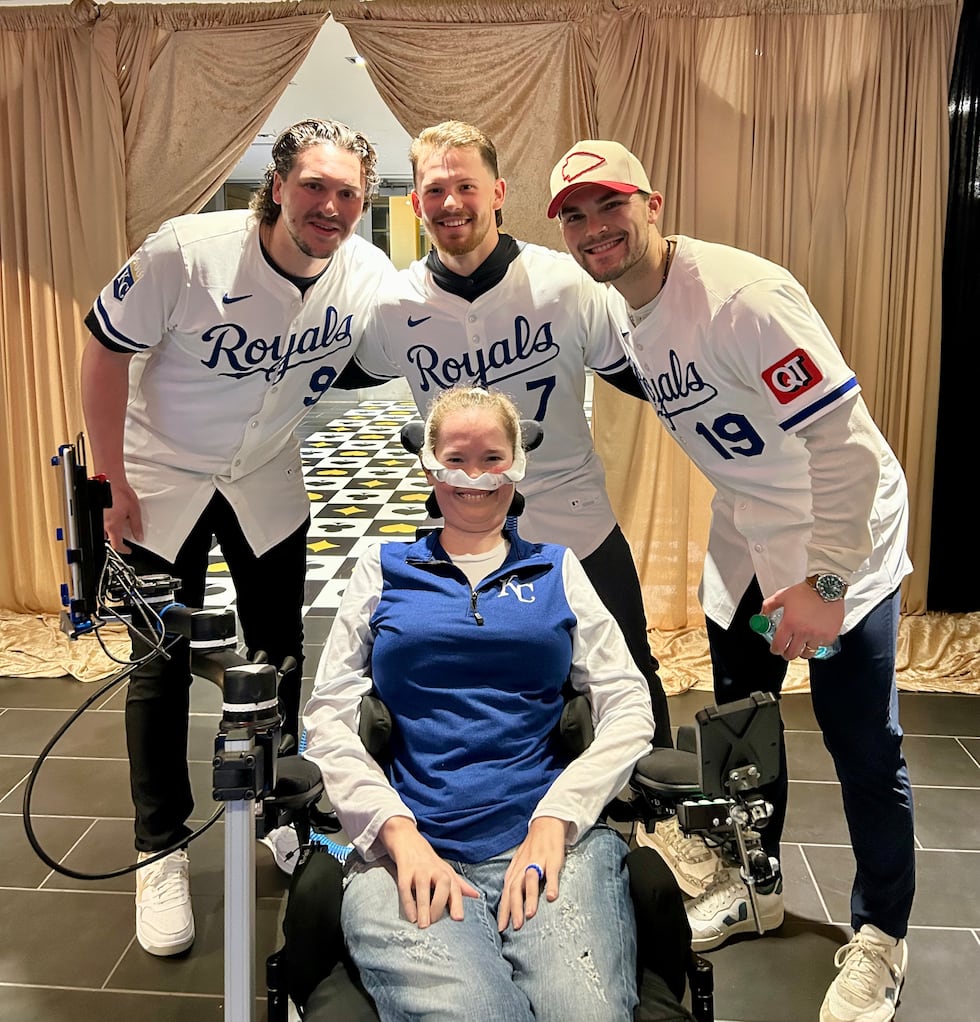 Sarah Na with Vinnie Pasquantino, Bobby Witt Jr. and Michael Massey.