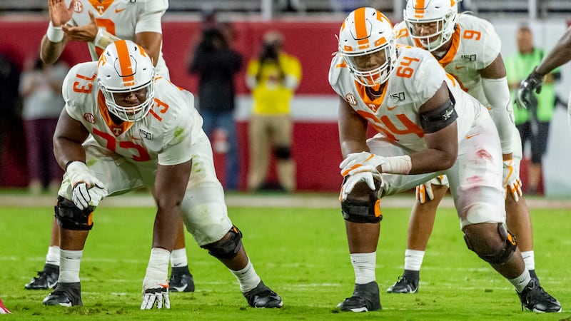 Tennessee offensive lineman Trey Smith (73) and Tennessee offensive lineman Wanya Morris (64)...