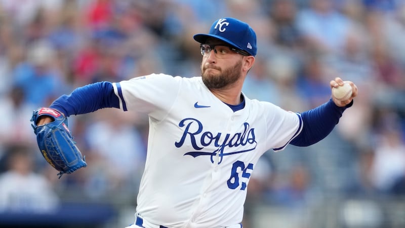 Kansas City Royals starting pitcher Noah Cameron throws in the first inning against the New...