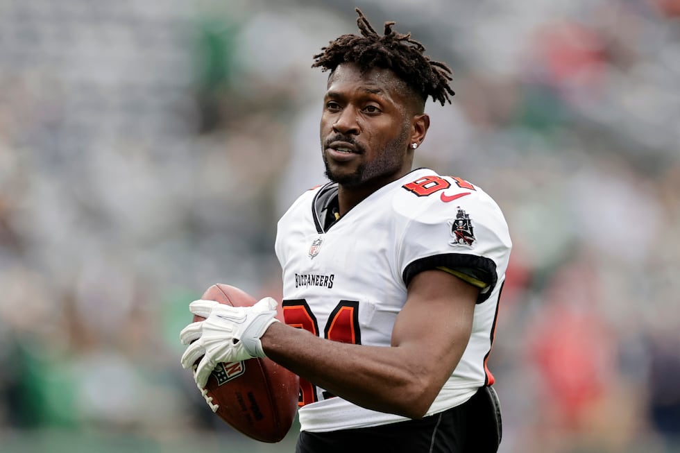 FILE - Tampa Bay Buccaneers wide receiver Antonio Brown (81) walks on the field during an NFL...