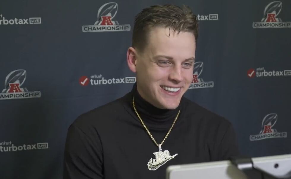 Joe Burrow postgame wearing a diamond "JB9" necklace.