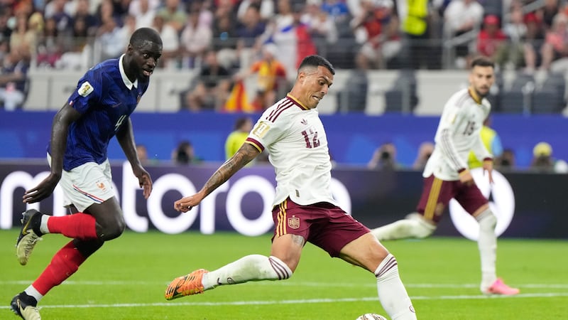 Spain's Pedro Porro scores his side's second goal during the World Cup semifinal soccer match...