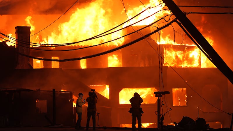 Beach front homes are destroyed by the Palisades Fire Wednesday, Jan. 8, 2025 in Malibu,...