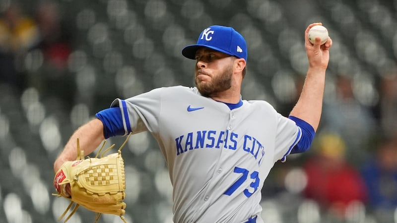 Kansas City Royals' Sam Long pitches during the seventh inning of a baseball game against the...