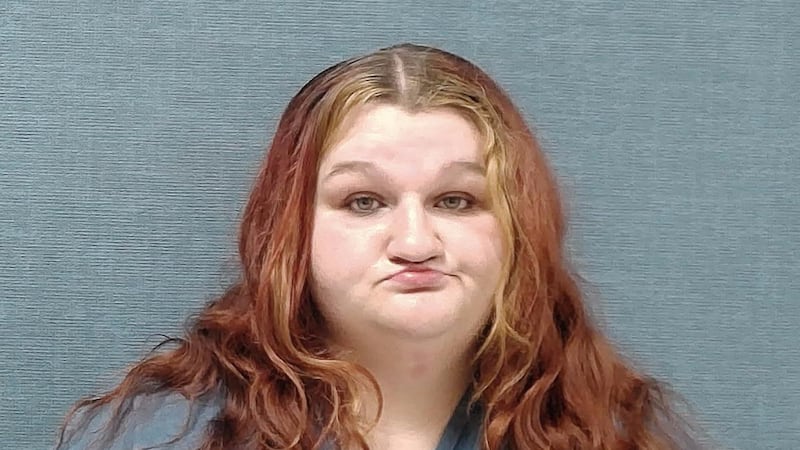 Destany Scott, 20, is accused of slamming an 11-year-old's head into a slide.