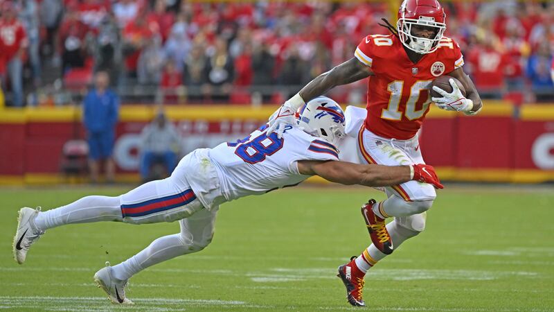 Buffalo Bills linebacker Matt Milano (58) tackles Kansas City Chiefs running back Isiah...