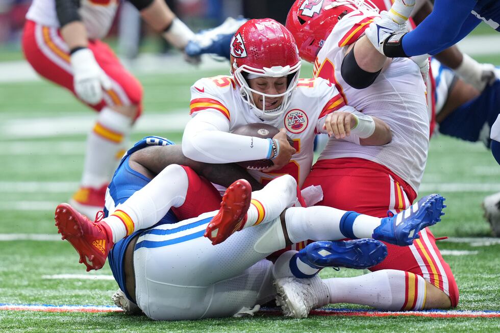 Kansas City Chiefs quarterback Patrick Mahomes (15) is sacked by Indianapolis Colts defensive...