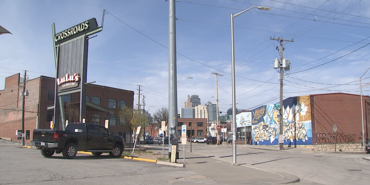 A food truck parked on a city street in Kansas City.