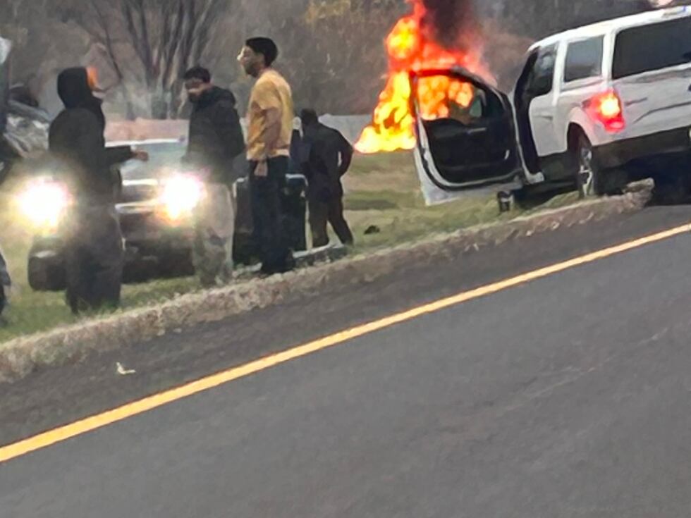 The Kia struck a bridge abutment, then caught fire.