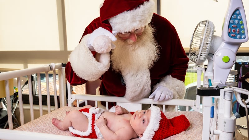 Santa visits the babies in the Neonatal Intensive Care Unit at MU Women’s Hospital.