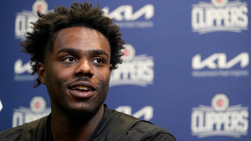 First-round draft pick Kobe Brown, selected 30th overall by Los Angeles Clippers, speaks at a...