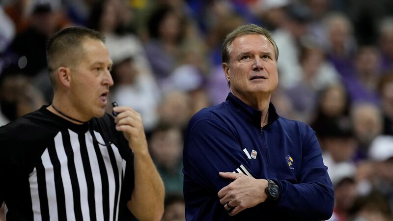 FILE: Kansas head coach Bill Self watches during the first half of an NCAA college basketball...