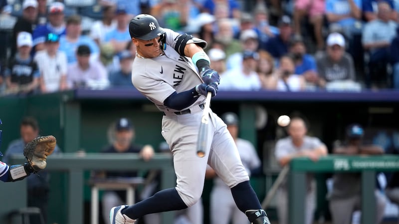 New York Yankees' Aaron Judge hits a two-run home run in the first inning during a baseball...
