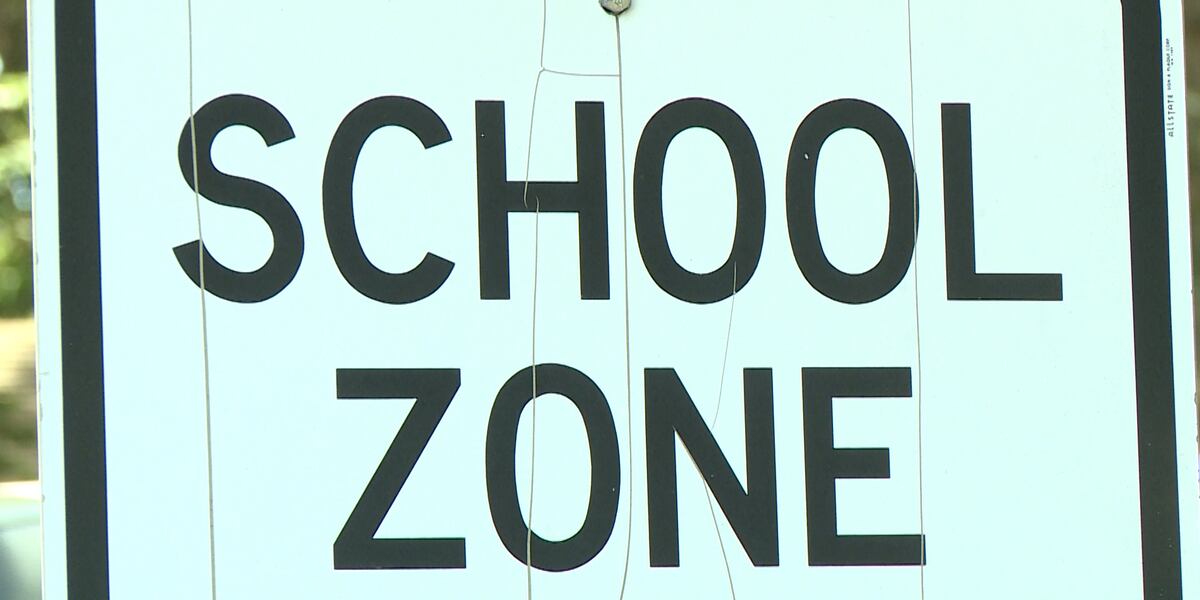 Swapp Signs Olathe working to swap signs as school times change