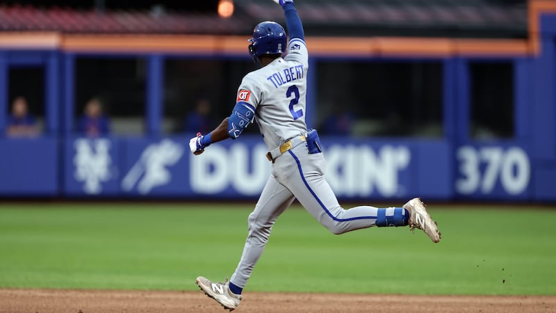 Kansas City Royals' Tyler Tolbert (2) rounds the bases after hitting a home run during the...