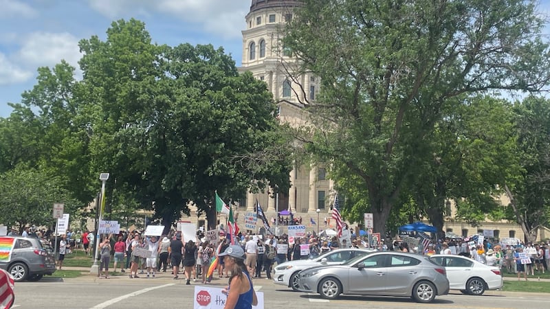 Hundreds of people gathered at the Kansas Statehouse to take part in a "No Kings" on Saturday,...