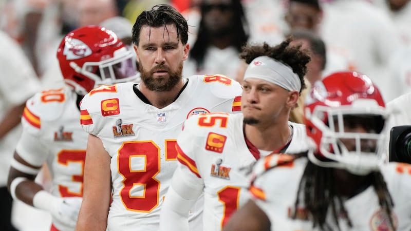 Kansas City Chiefs tight end Travis Kelce (87) quarterback Patrick Mahomes (15) and running...