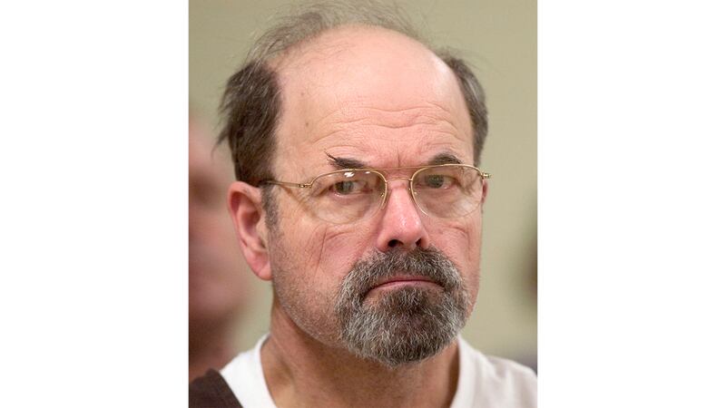 FILE - Convicted BTK killer Dennis Rader listens during a court proceeding, Oct. 12, 2005, in...